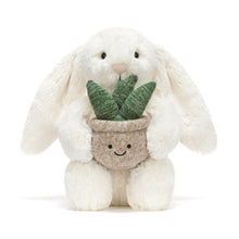 Load image into Gallery viewer, Jellycat Bashful Cream Bunny plush holding potted plant
