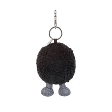 Load image into Gallery viewer, Amuseables Black Hole Bag Charm by Jellycat with smiling face, cord legs, and metal clip attachment
